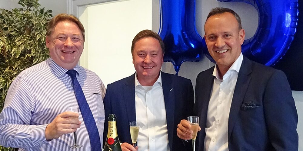 Fuel_15_3 Mark Esom, Steve Willmore and Murray West celebrate 15 years of Fuel Recruitment with champagne, cake and balloons